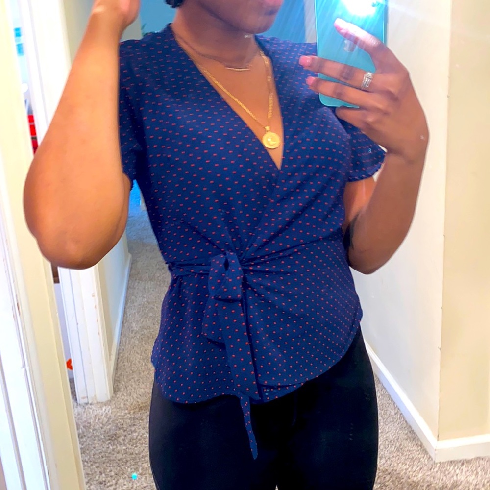 blue and red dotted shirt